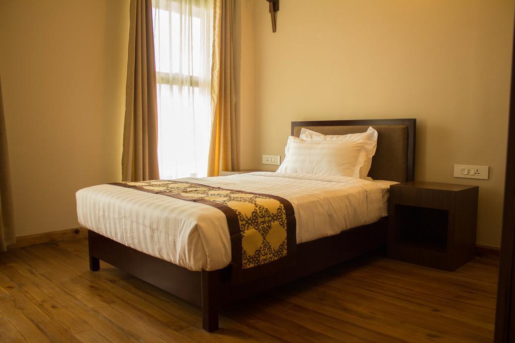 Ariya Hotel Тхимпху Стая снимка