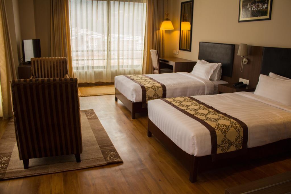 Ariya Hotel Тхимпху Стая снимка